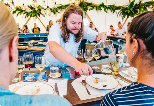 customers being served at food festival