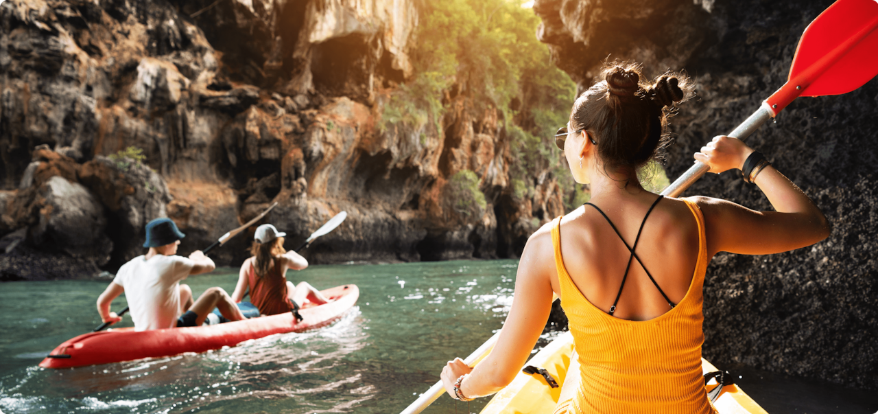 woman and two friends kayaking