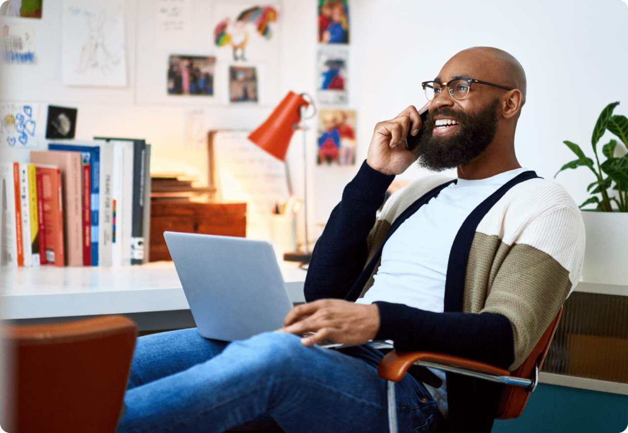 man managing expenses on laptop