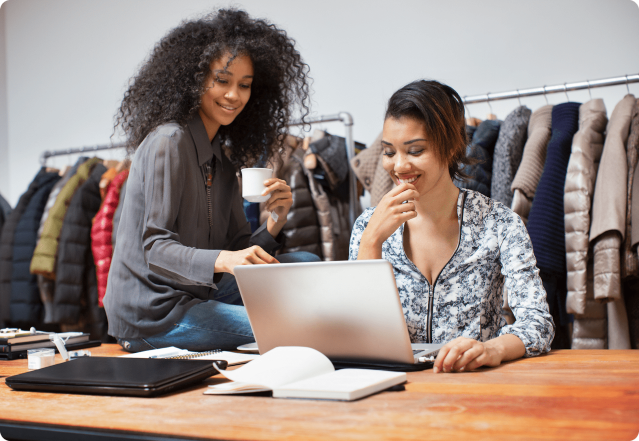 small business owners working on laptop