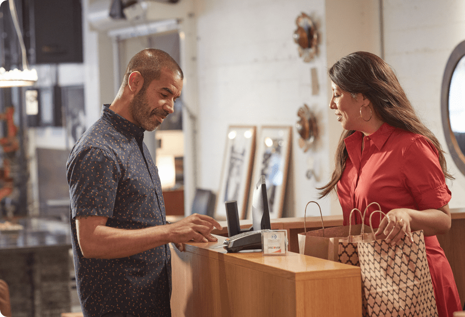 customer typing in pin at checkout