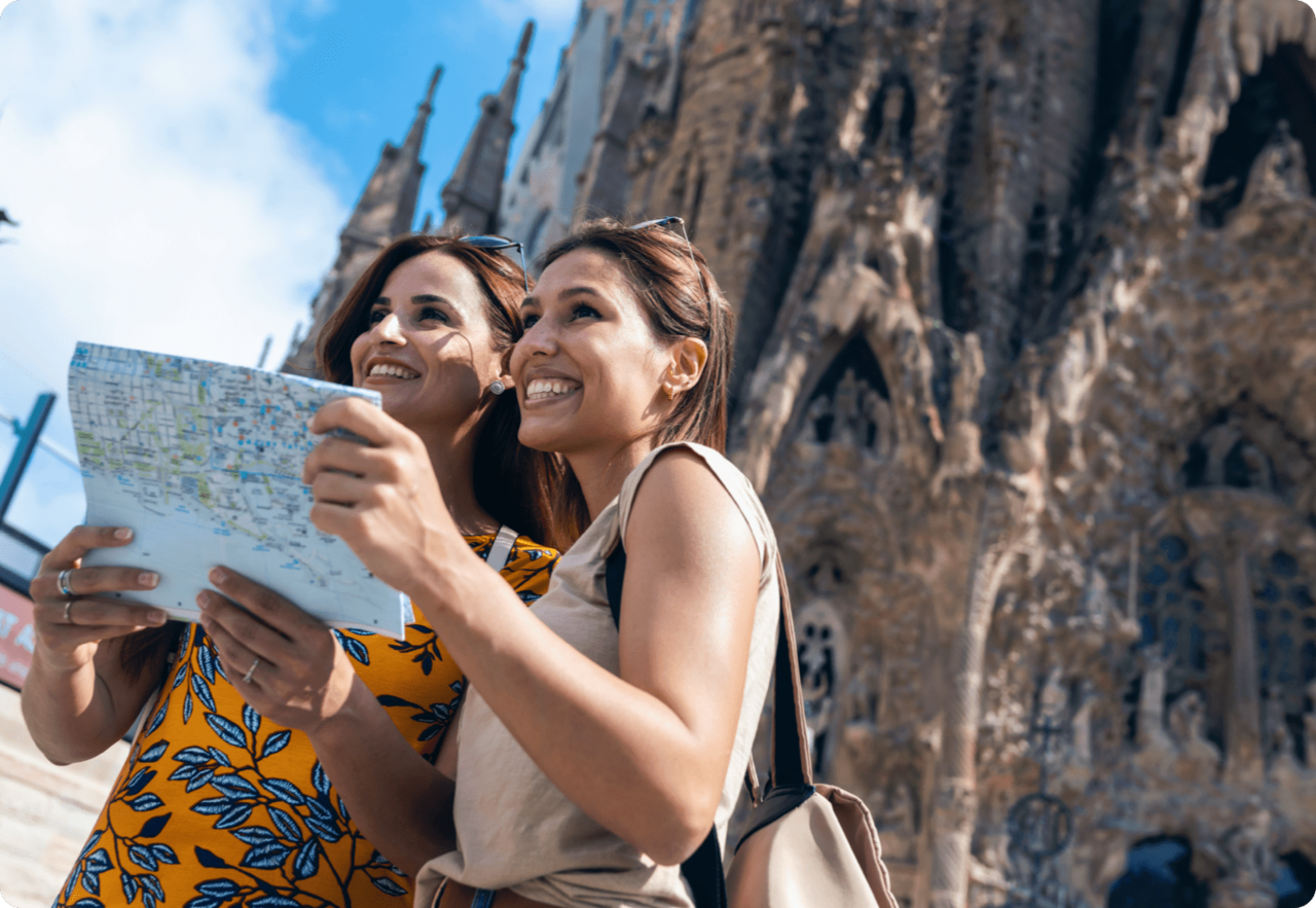 tourist with a map exploring barcelona