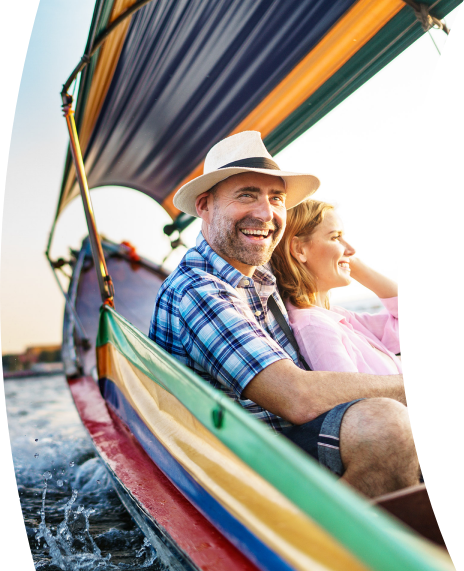 man and woman sitting in multicolored chair